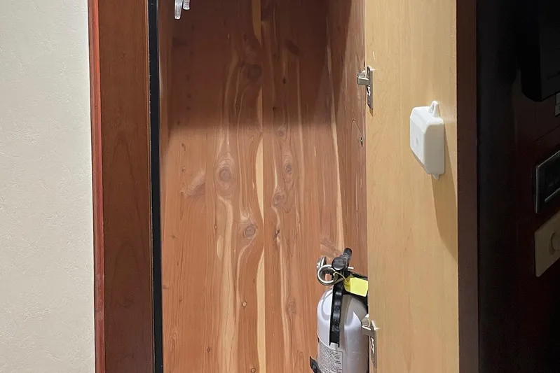 Still Waters Yacht Photos Pics Wooden cabinet with fire extinguisher inside, Sea Ray 44 Sedan Bridge 2007.