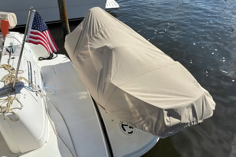 Still Waters Yacht Photos Pics 2007 Sea Ray 44 Sedan Bridge with covered equipment and American flag at dock.