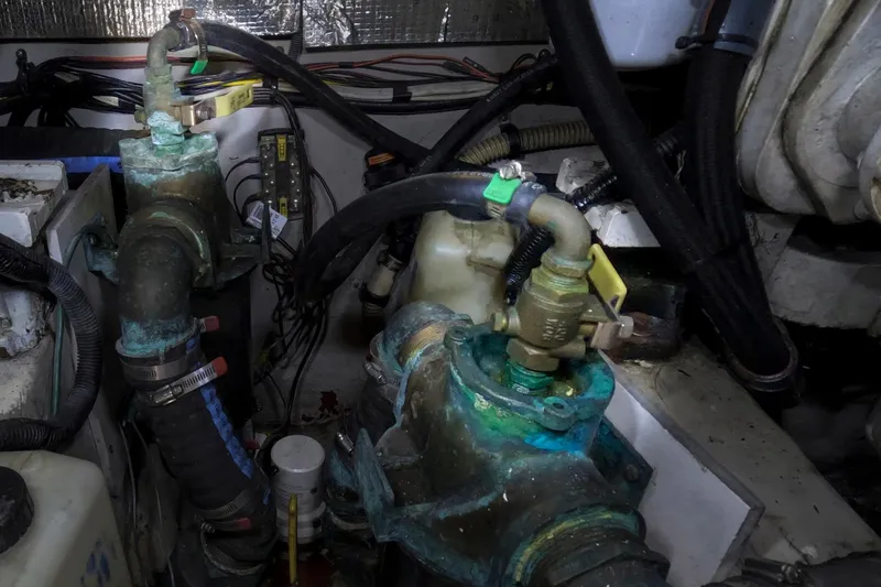 Still Waters Yacht Photos Pics Engine room of 2007 Sea Ray 44 Sedan Bridge with corroded valves and pipes.