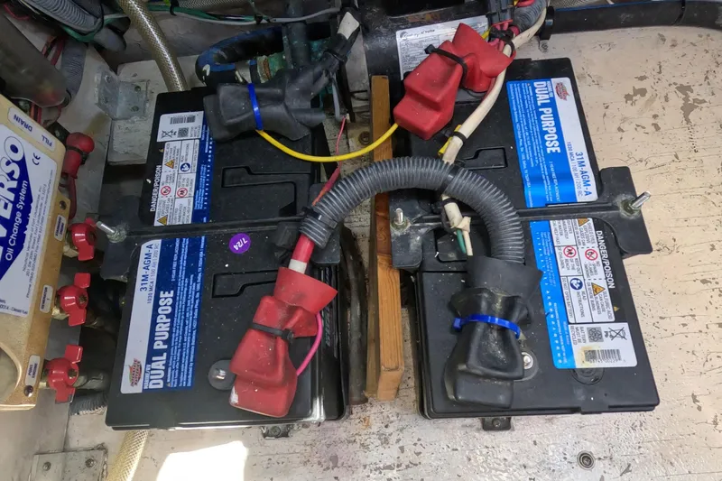 Still Waters Yacht Photos Pics Dual purpose batteries in a 2007 Sea Ray 44 Sedan Bridge engine compartment.