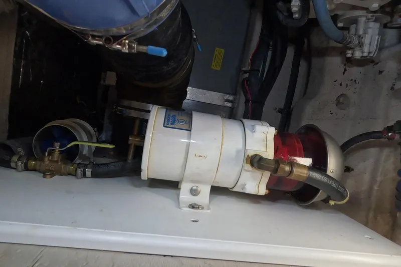 Still Waters Yacht Photos Pics Engine compartment of 2007 Sea Ray 44 Sedan Bridge with fuel filter and hoses.