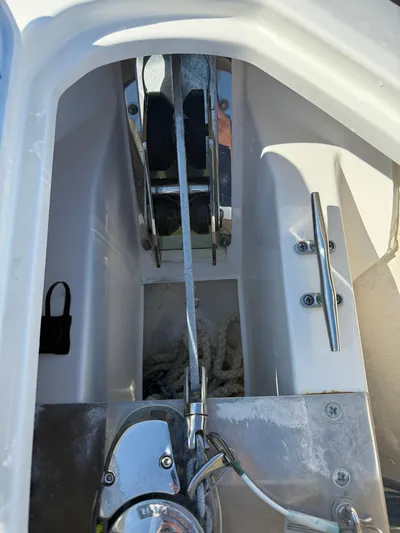  Yacht Photos Pics Anchor system of 2023 Pursuit S 268 Sport boat, featuring winch and rope storage.