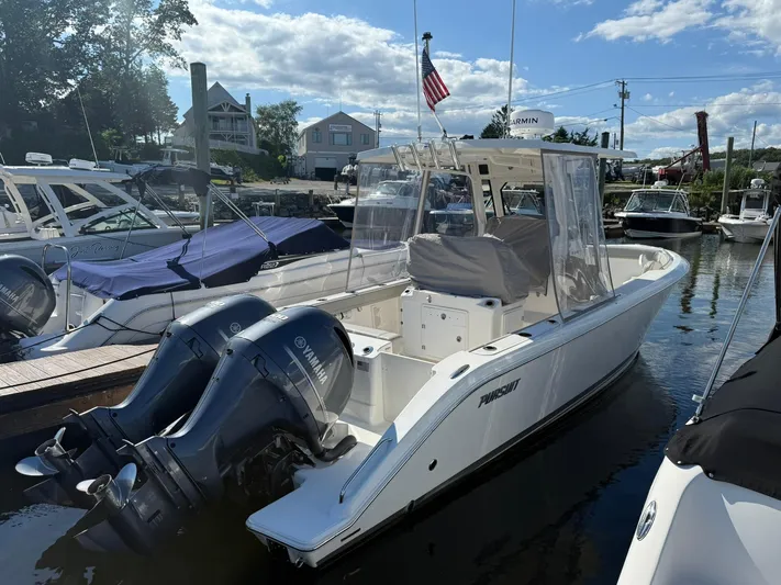  Yacht Photos Pics 2023 Pursuit S 268 Sport boat docked with twin Yamaha engines.