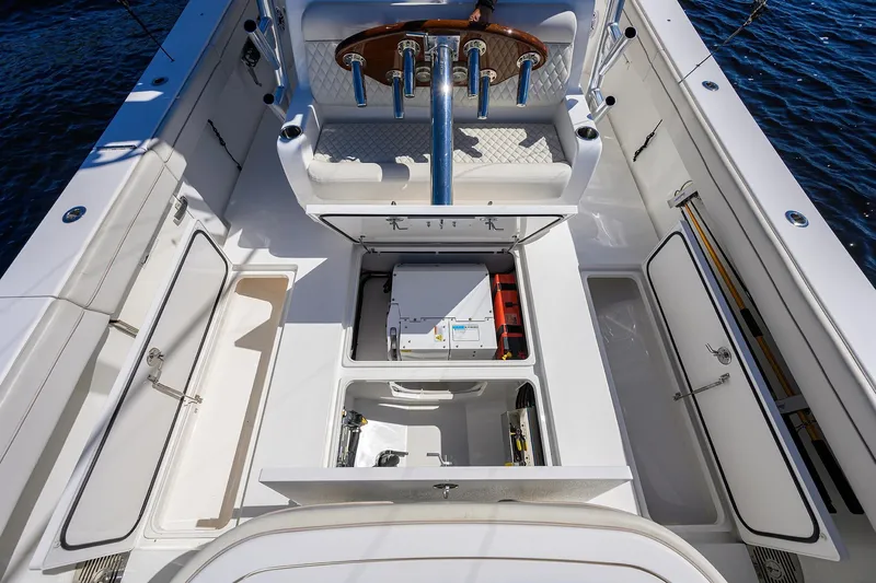 Miss Allied Yacht Photos Pics 2022 Valhalla V41 boat interior with open storage compartments and seating.