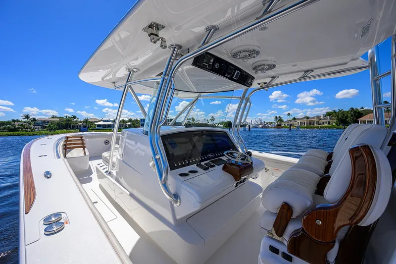Miss Allied Yacht Photos Pics 2022 Valhalla V41 boat interior with luxurious seating and advanced navigation system.