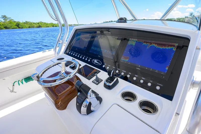 Miss Allied Yacht Photos Pics 2022 Valhalla V41 boat dashboard with advanced navigation screens and controls.