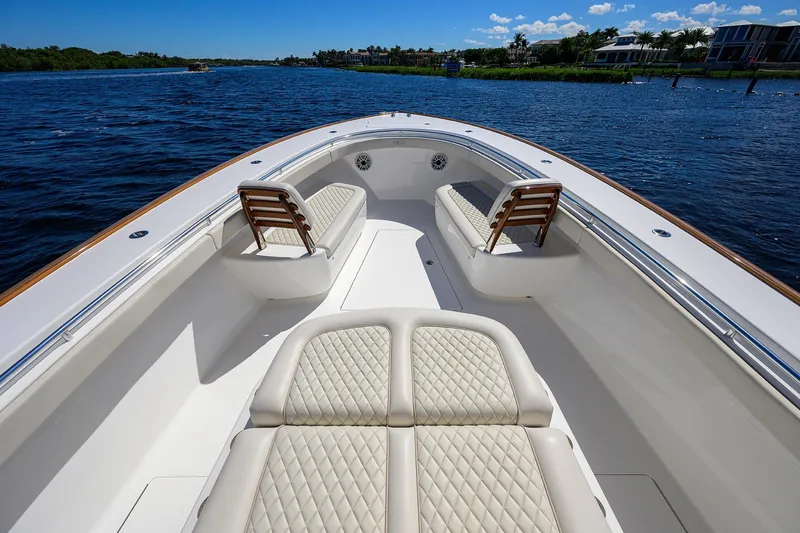 Miss Allied Yacht Photos Pics Luxurious 2022 Valhalla V41 boat interior with elegant seating on a sunny day.