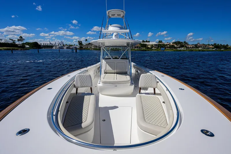 Miss Allied Yacht Photos Pics 2022 Valhalla V41 boat with luxurious seating on a sunny day.