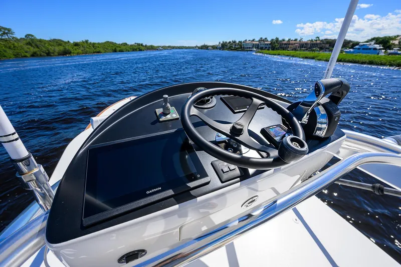 Miss Allied Yacht Photos Pics 2022 Valhalla V41 boat helm with Garmin display on a sunny day.