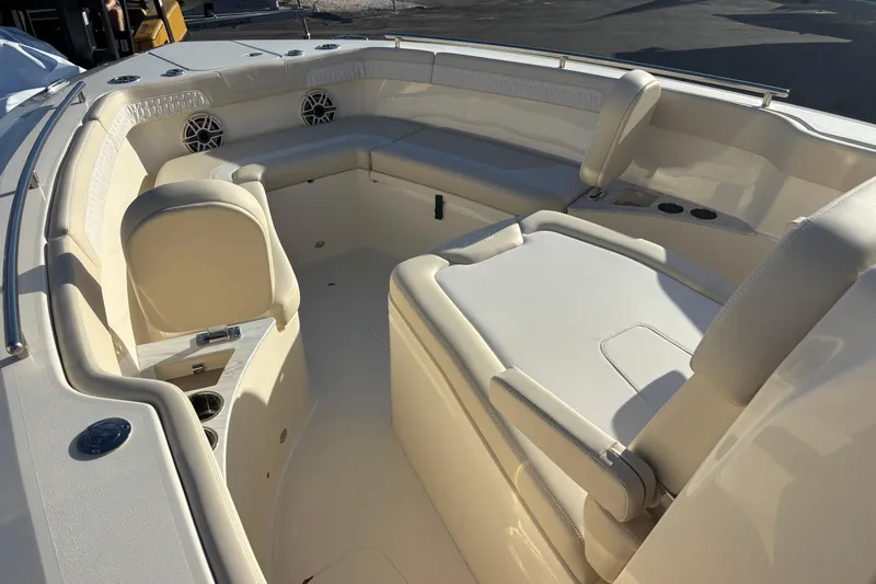  Yacht Photos Pics 2026 Scout 260 LXF boat interior with luxurious seating and cup holders.