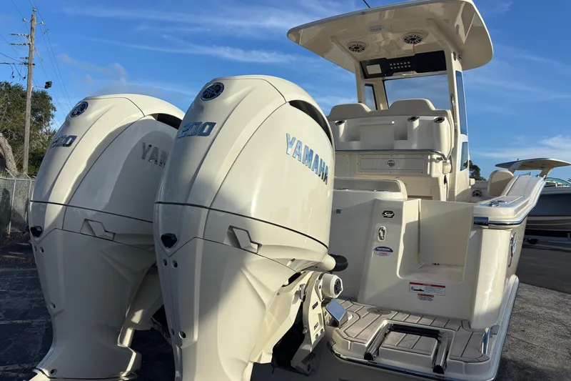  Yacht Photos Pics 2026 Scout 260 LXF boat with twin Yamaha engines, rear view.