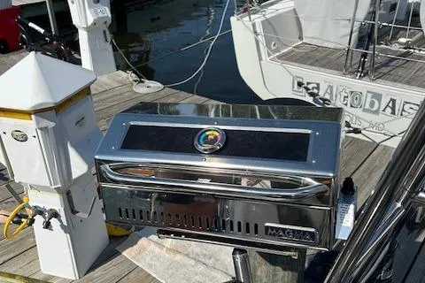 Godspeed Yacht Photos Pics Stainless steel grill on a docked Nautitech 44 Open catamaran, 2023 model.