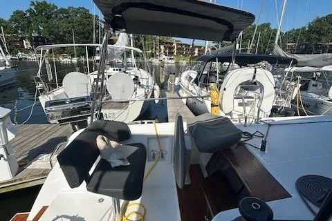 Godspeed Yacht Photos Pics 2023 Nautitech 44 Open catamaran docked at marina, featuring spacious deck and seating.