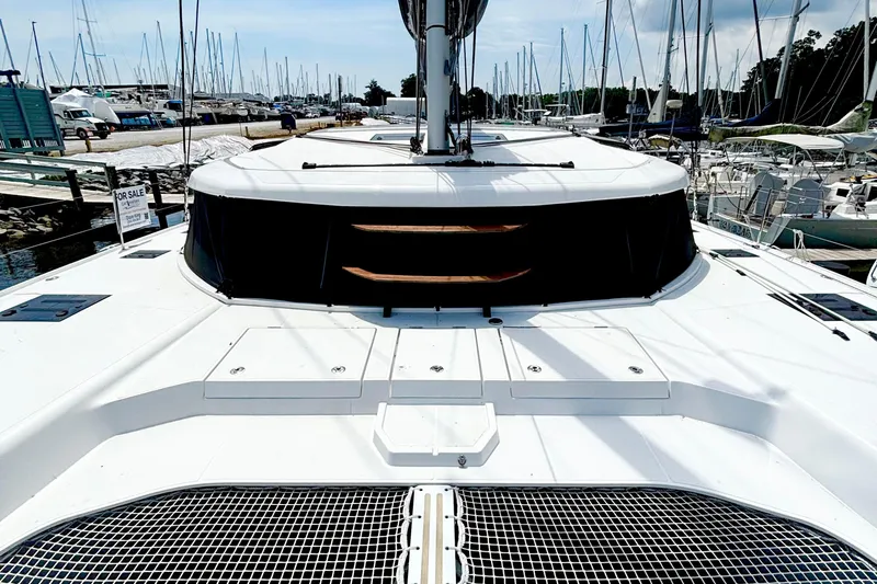 Godspeed Yacht Photos Pics 2023 Nautitech 44 Open catamaran docked at marina, available for sale.