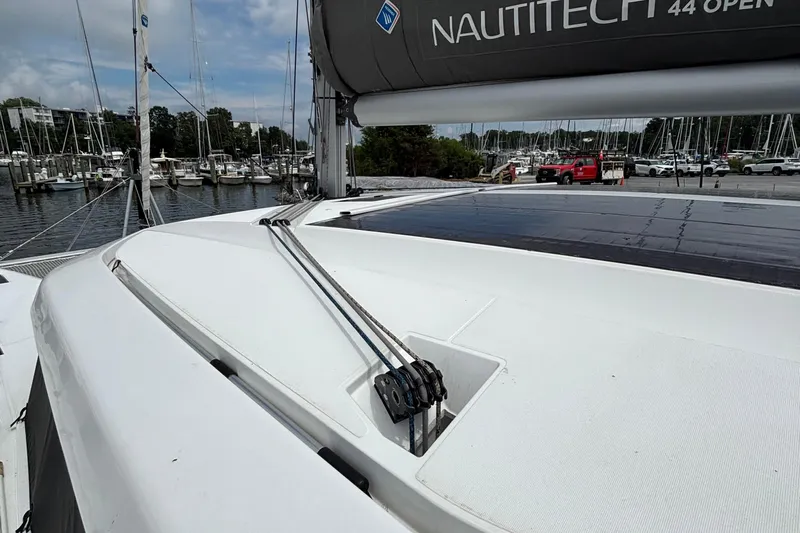 Godspeed Yacht Photos Pics 2023 Nautitech 44 Open catamaran docked at marina, showcasing sleek deck design.