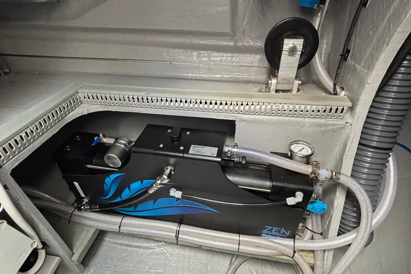 Godspeed Yacht Photos Pics Engine compartment of 2023 Nautitech 44 Open with ZEN system and hoses.