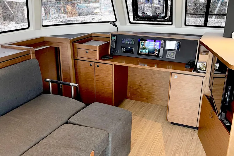Godspeed Yacht Photos Pics Interior of 2023 Nautitech 44 Open yacht with modern navigation station.