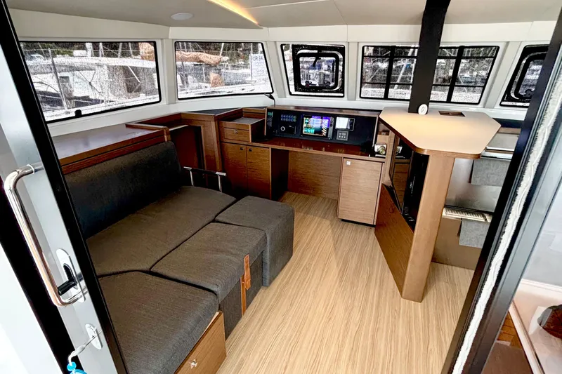 Godspeed Yacht Photos Pics Interior of 2023 Nautitech 44 Open yacht with modern design and wood accents.