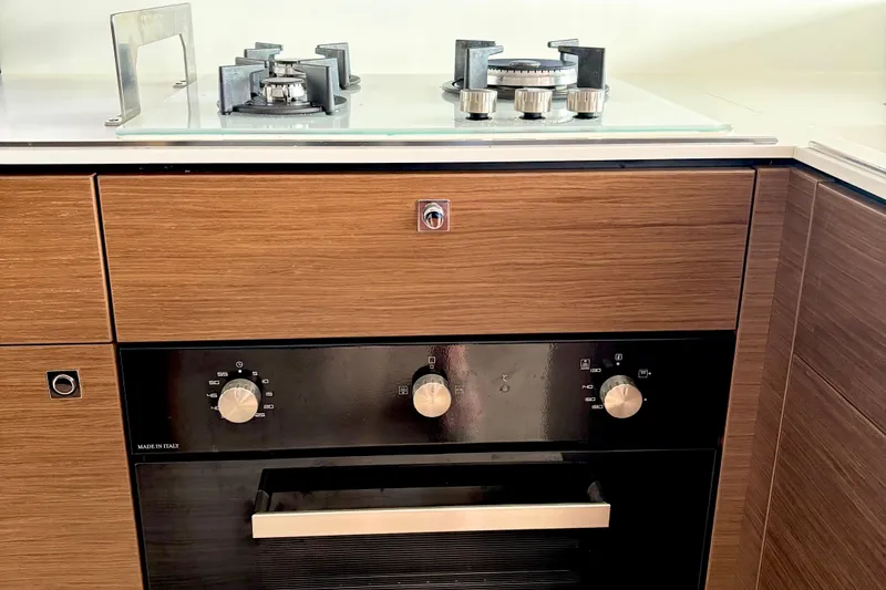 Godspeed Yacht Photos Pics Modern kitchen in 2023 Nautitech 44 Open yacht with stove and oven.