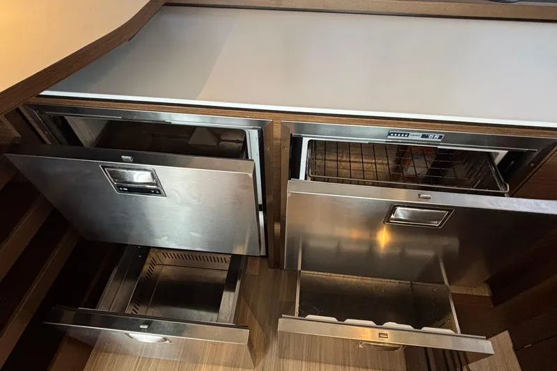 Godspeed Yacht Photos Pics Stainless steel drawers in 2023 Nautitech 44 Open yacht kitchen interior.