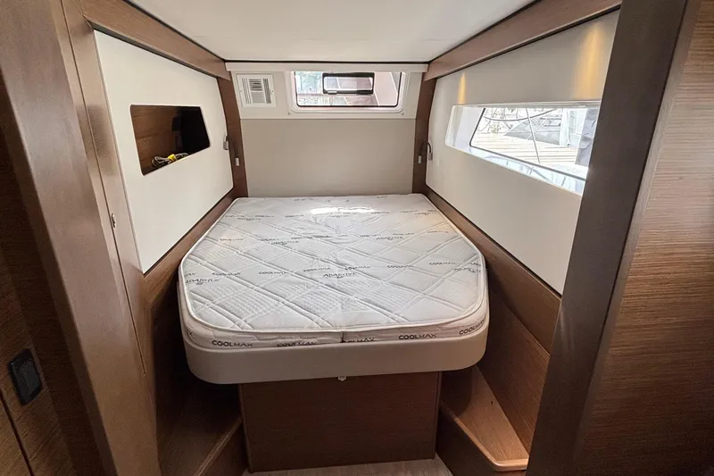 Godspeed Yacht Photos Pics Cabin interior of 2023 Nautitech 44 Open yacht with a comfortable bed.