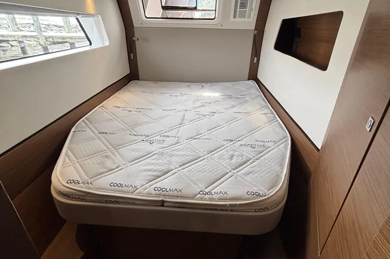 Godspeed Yacht Photos Pics 2023 Nautitech 44 Open cabin with Coolmax mattress, modern wood finish.