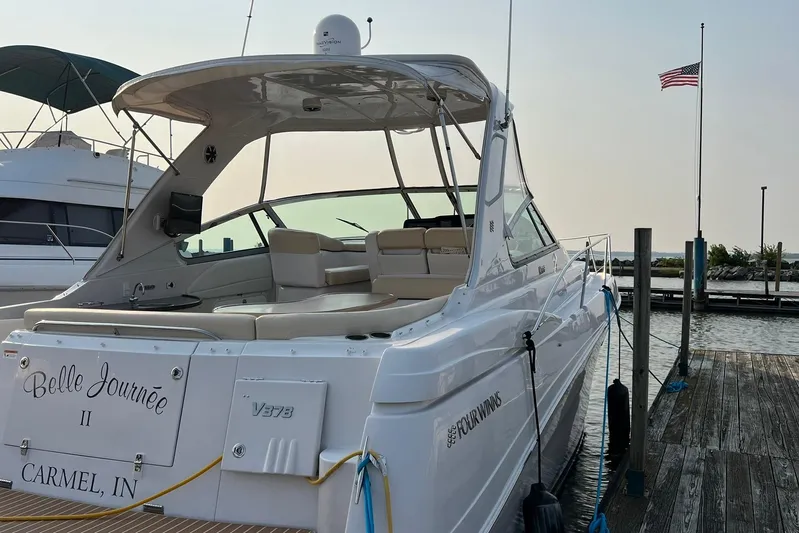  Yacht Photos Pics 2008 Four Winns 378 Vista yacht docked, featuring spacious seating and sleek design.