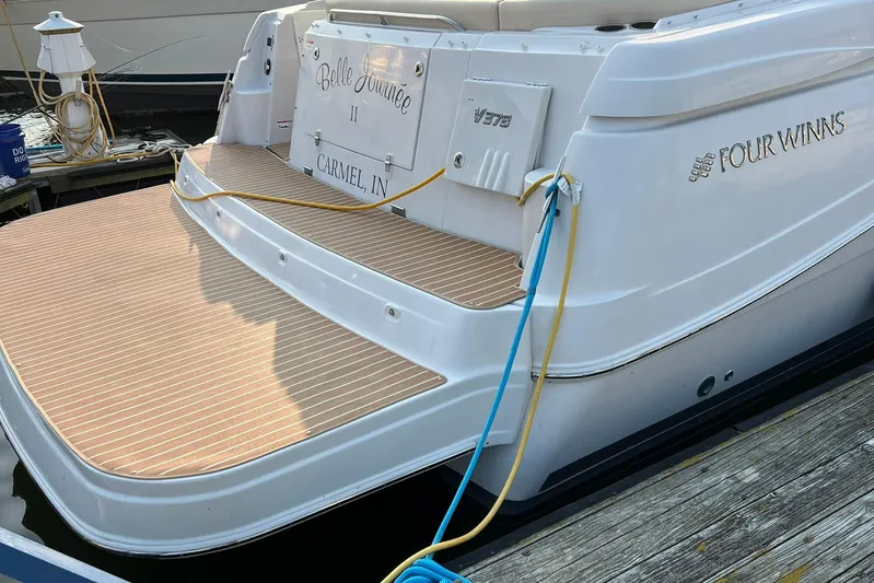  Yacht Photos Pics 2008 Four Winns 378 Vista yacht docked, featuring a spacious swim platform.