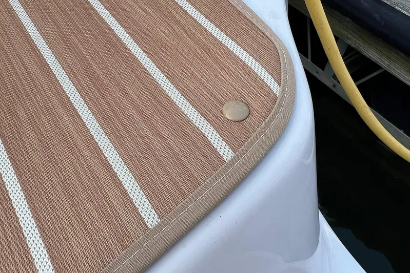  Yacht Photos Pics 2008 Four Winns 378 Vista boat deck with striped mat and button detail.