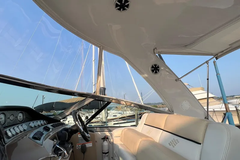  Yacht Photos Pics Interior view of 2008 Four Winns 378 Vista yacht with steering wheel and seating.