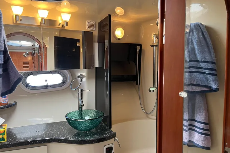  Yacht Photos Pics Luxurious bathroom in 2008 Four Winns 378 Vista yacht with modern fixtures and elegant design.