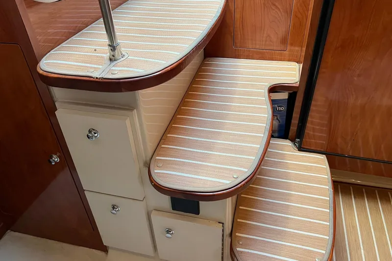  Yacht Photos Pics Interior steps of 2008 Four Winns 378 Vista boat with wood finish.