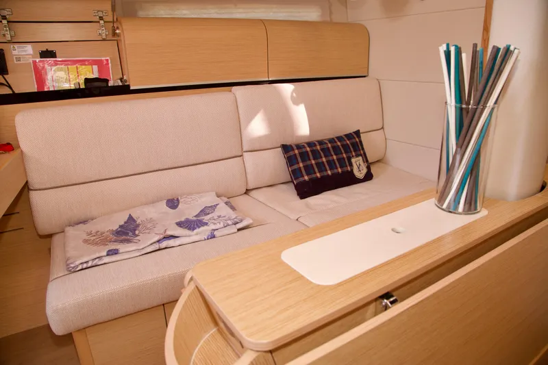  Yacht Photos Pics Interior of 2021 Hanse Dehler 38SQ yacht with cozy seating and modern decor.