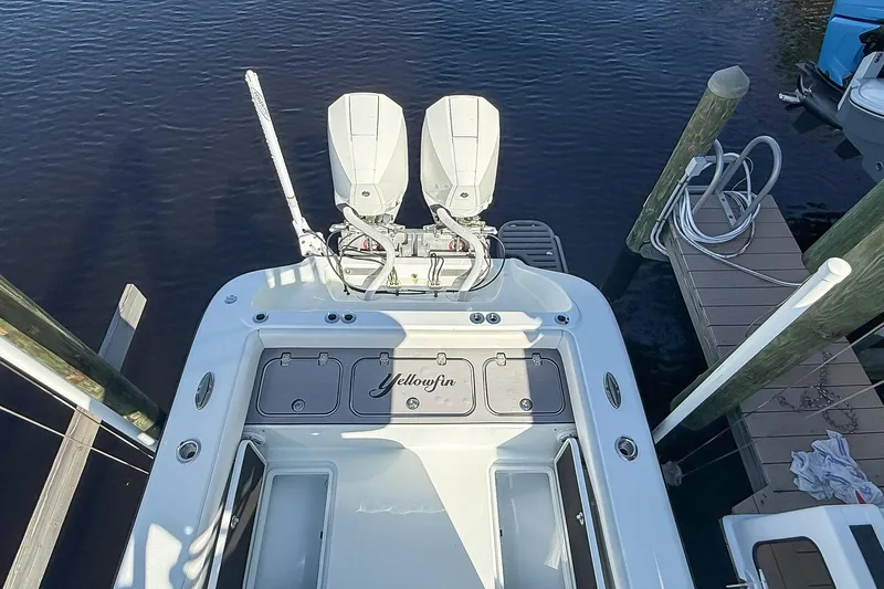  Yacht Photos Pics 2022 Yellowfin 26 Hybrid boat with dual engines docked at marina.