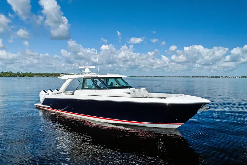 Moonrunner Yacht Photos Pics 2024 Tiara Yachts 48 LS cruising on a calm, sunny day.