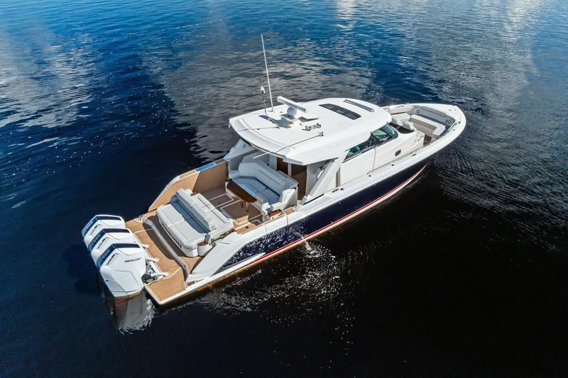 Moonrunner Yacht Photos Pics 2024 Tiara Yachts 48 LS luxury boat on calm water, aerial view.
