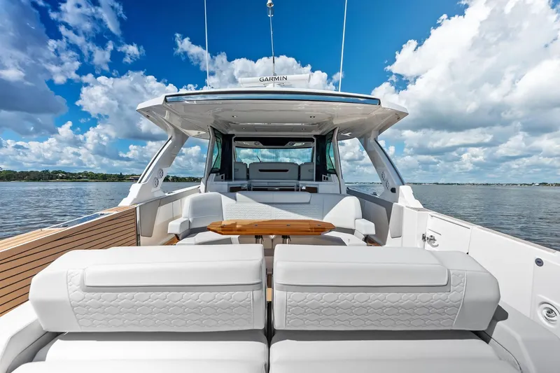 Moonrunner Yacht Photos Pics 2024 Tiara Yachts 48 LS luxury yacht interior with elegant seating and ocean view.