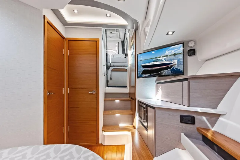 Moonrunner Yacht Photos Pics Luxurious interior of 2024 Tiara Yachts 48 LS, featuring modern design and elegant wood finishes.