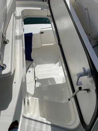  Yacht Photos Pics 2005 Sea Ray 420 Sedan Bridge interior stairs with open hatch, showcasing sleek design.