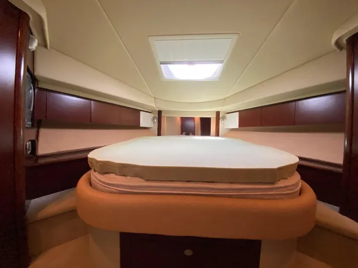  Yacht Photos Pics Luxurious cabin interior of 2005 Sea Ray 420 Sedan Bridge yacht with skylight.