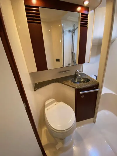  Yacht Photos Pics 2005 Sea Ray 420 Sedan Bridge bathroom with modern fixtures and elegant design.
