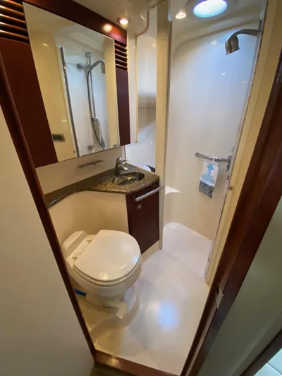  Yacht Photos Pics 2005 Sea Ray 420 Sedan Bridge bathroom with shower, sink, and toilet.