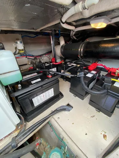  Yacht Photos Pics Engine room of a 2005 Sea Ray 420 Sedan Bridge with batteries and wiring.