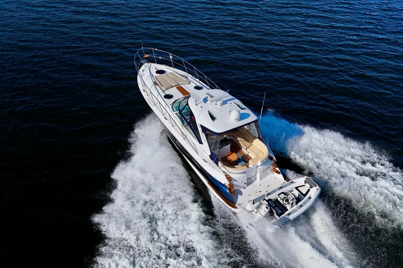 Outstanding Yacht Photos Pics Aerial view of 2007 Doral Alegria yacht cruising on open water.