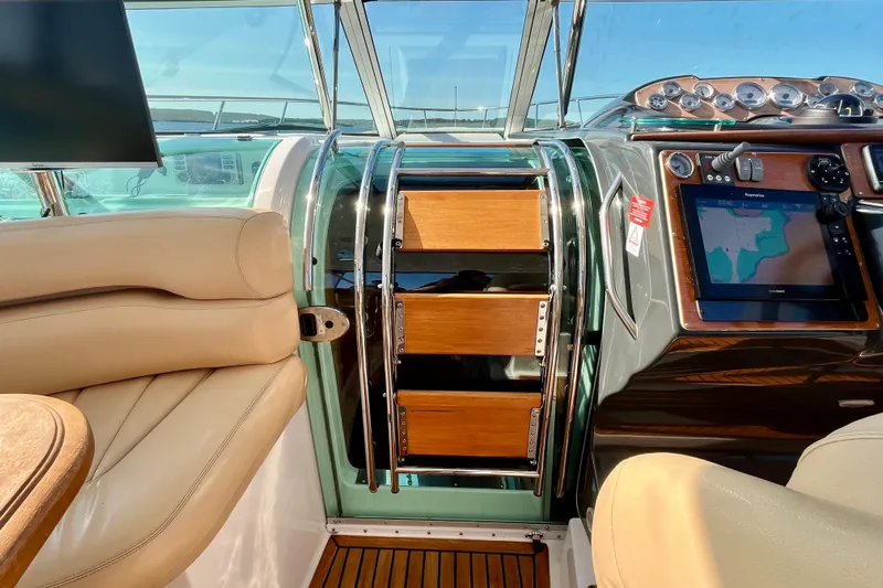 Outstanding Yacht Photos Pics 2007 Doral Alegria boat interior with leather seating and navigation system.