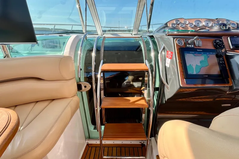 Outstanding Yacht Photos Pics Interior of 2007 Doral Alegria boat with leather seating and navigation system.