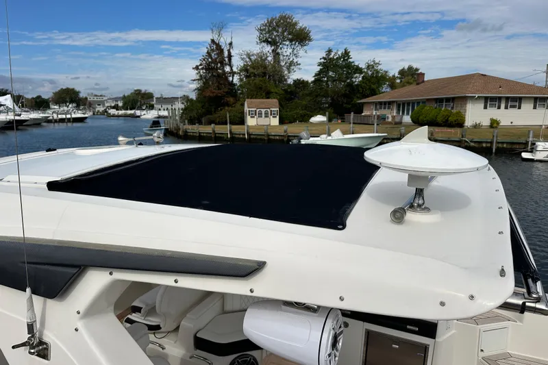  Yacht Photos Pics 2019 Sea Ray SLX 350 Outboard boat docked, featuring sleek design and modern amenities.