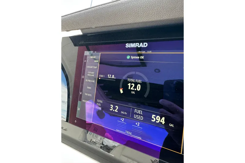  Yacht Photos Pics Simrad display on 2019 Sea Ray SLX 350 Outboard showing fuel data and system status.