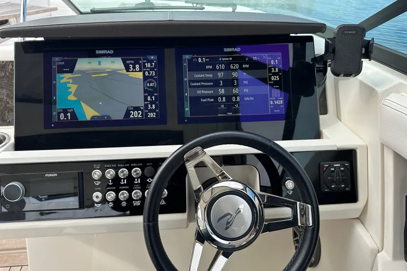  Yacht Photos Pics 2019 Sea Ray SLX 350 Outboard dashboard with dual Simrad displays and steering wheel.