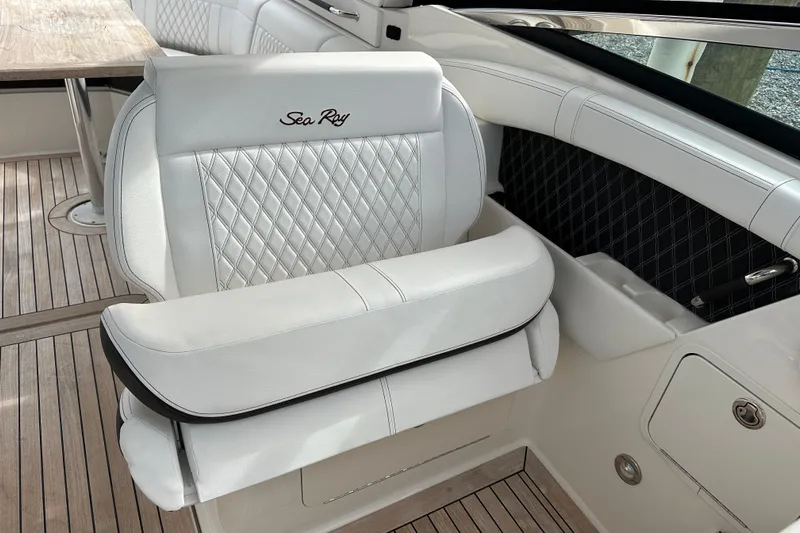  Yacht Photos Pics Luxurious white seating on 2019 Sea Ray SLX 350 Outboard boat interior.